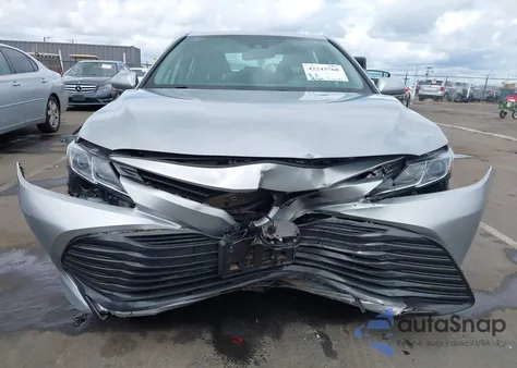 2019 Toyota Camry Le from USA, damaged, VIN 4T1B11HK0KU297733